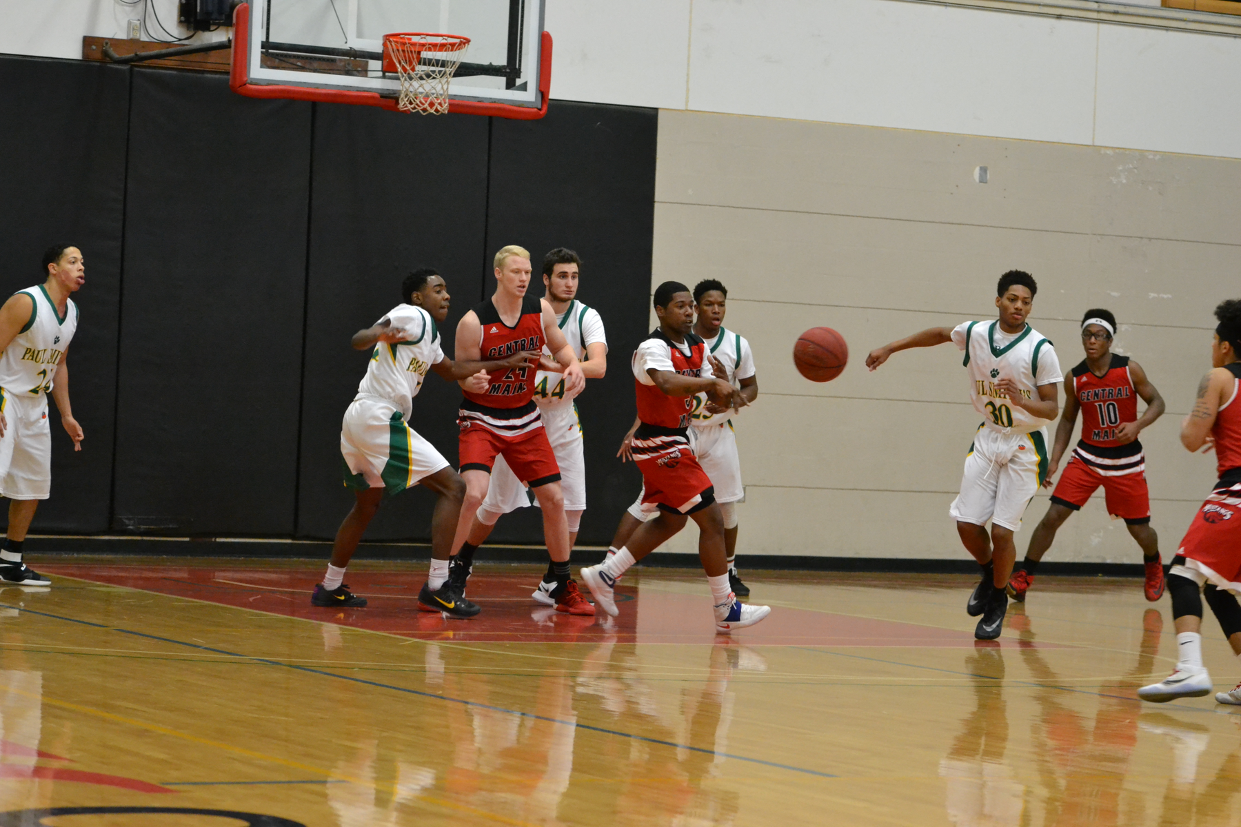 Mustangs Dump Wolverines Behind Laurie's Triples
