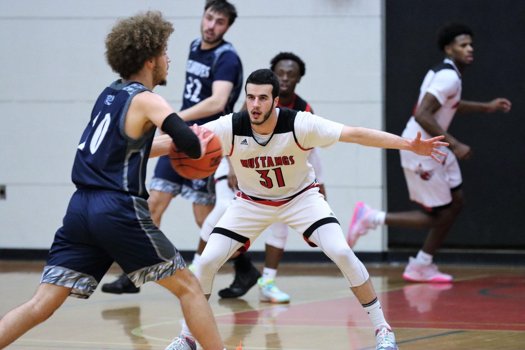 Mustangs Finish Season with a 94-86 Loss to NHTI