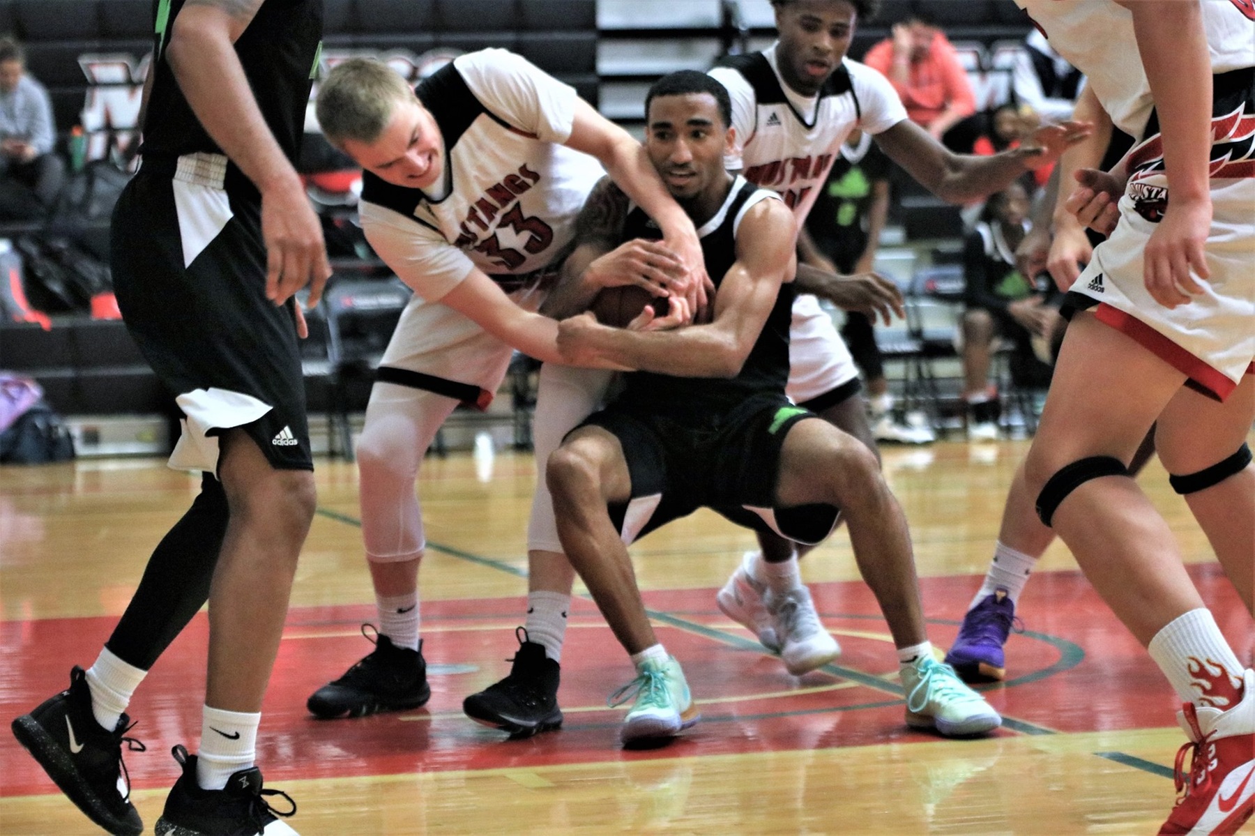 Mustangs Mow Down Rams 90-46