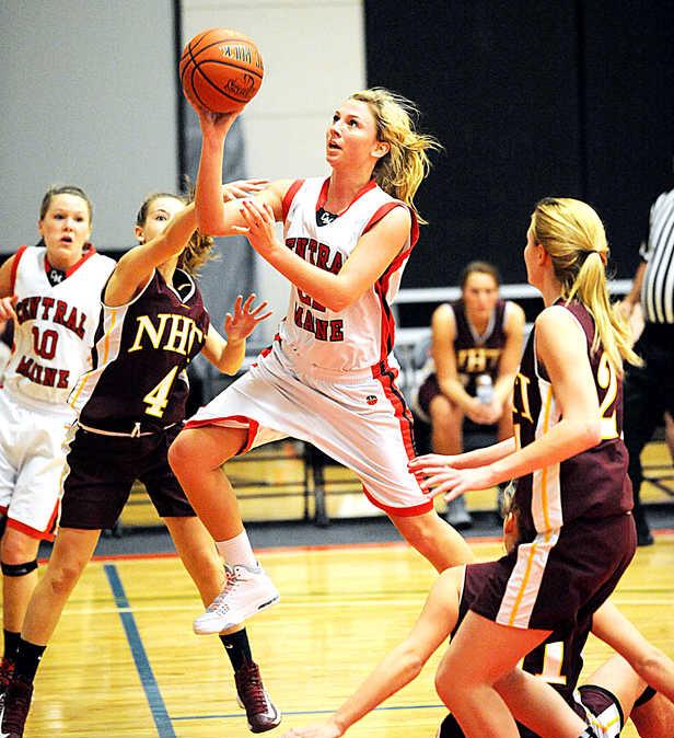 Maggie Sabine scores 1,000th career point