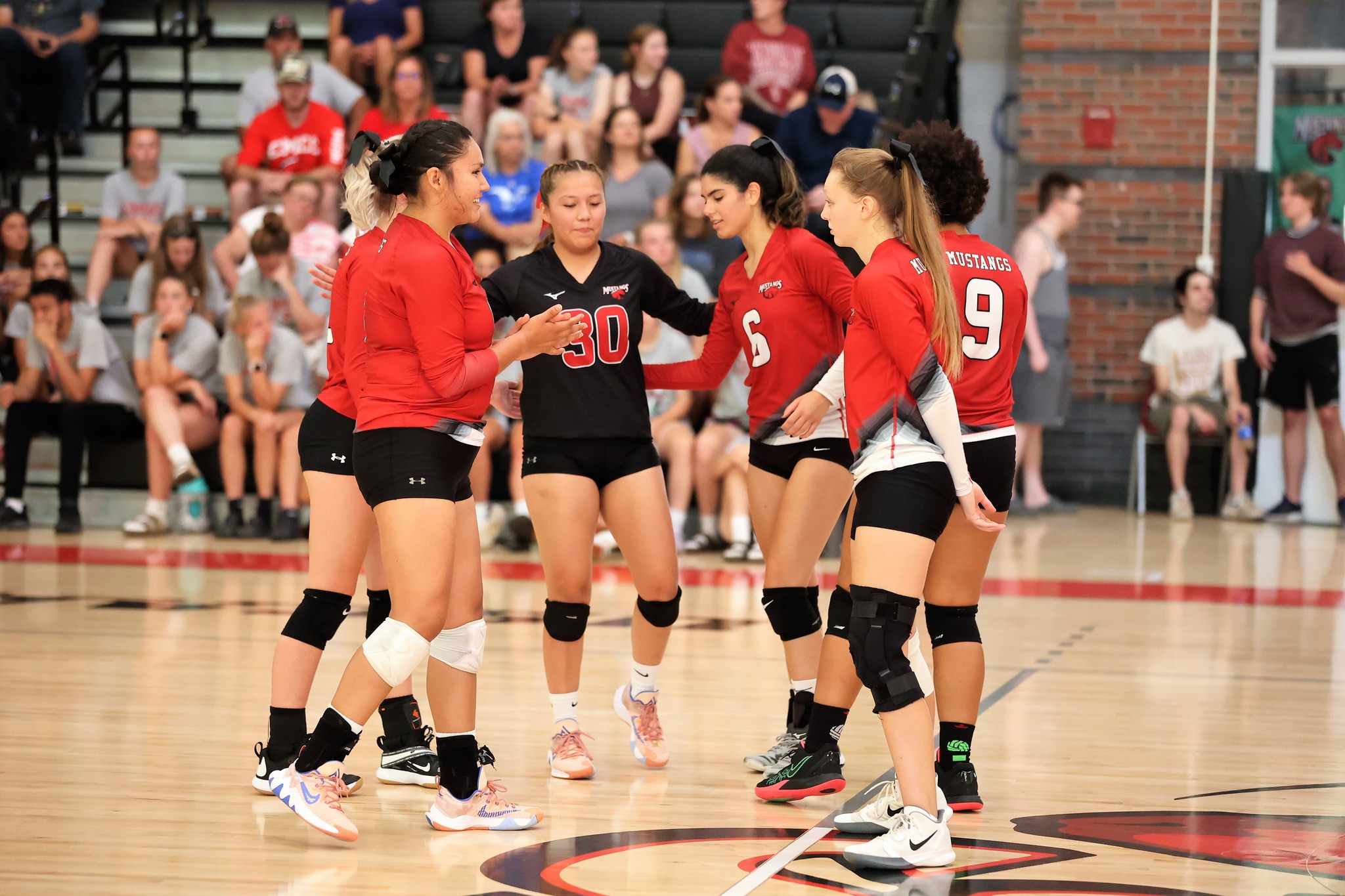 Mustangs Break Even On The Road