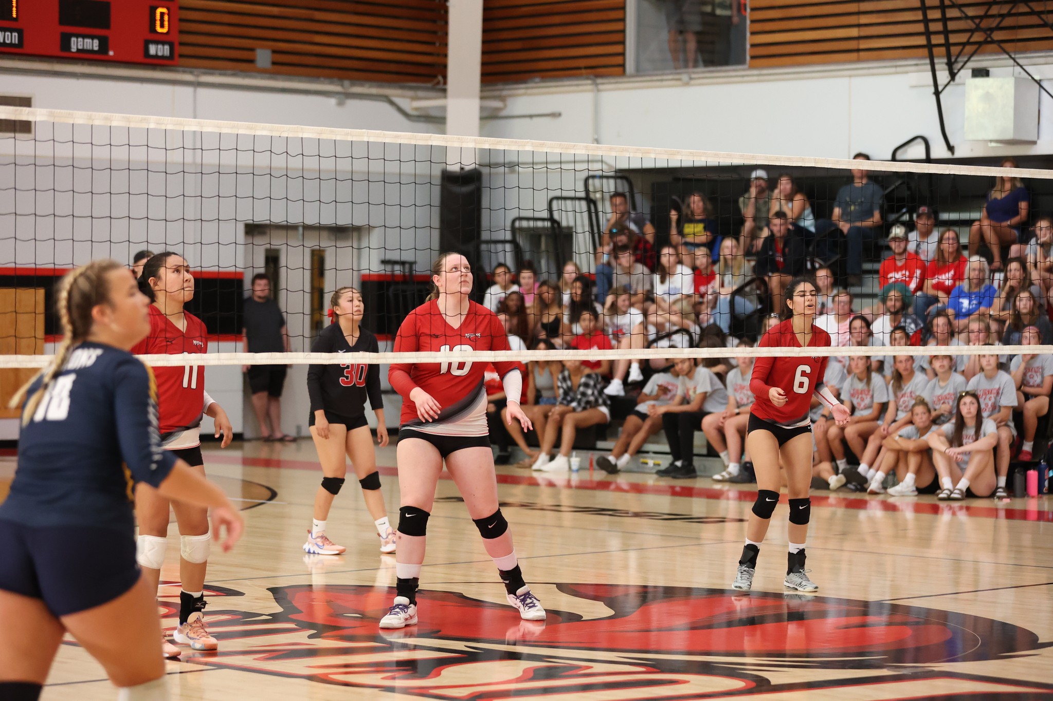 Mustangs handle Knights in three sets